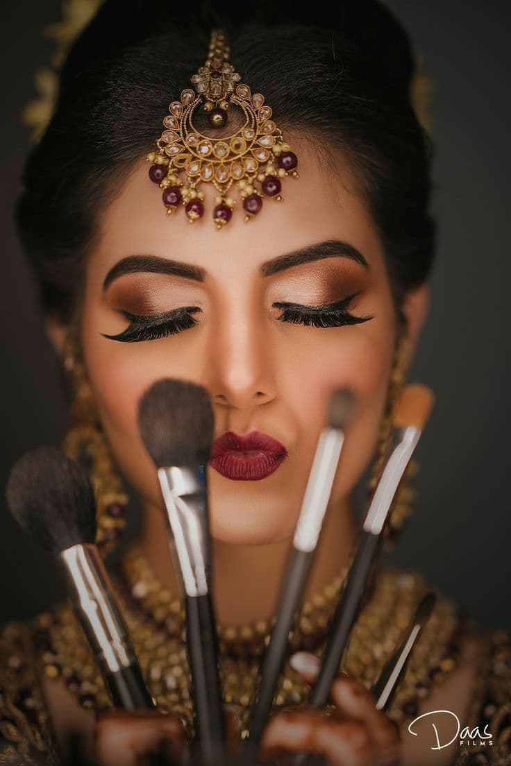 Keziah at work — luxury bridal makeup brushes